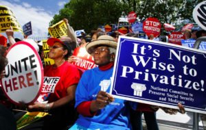 Gladys Mitchell, 80, right, from Washington, and Louise Hobbs, 71, left, from New York, N.Y. join a rally against the privatization of Social Security, on Capitol Hill on Tuesday.Manuel Balce Ceneta / AP
